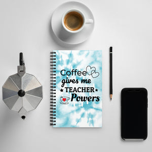 Coffee gives me Teacher Powers notebook with tie dye on a desk with pencil, kettle, coffee mug and phone.